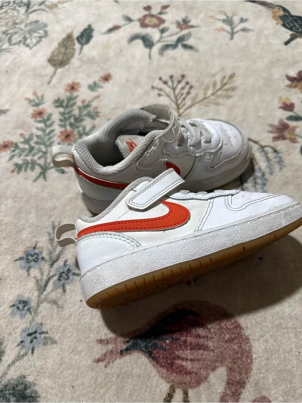Nike White Kids Sneakers with Orange Swoosh Accent 8C
